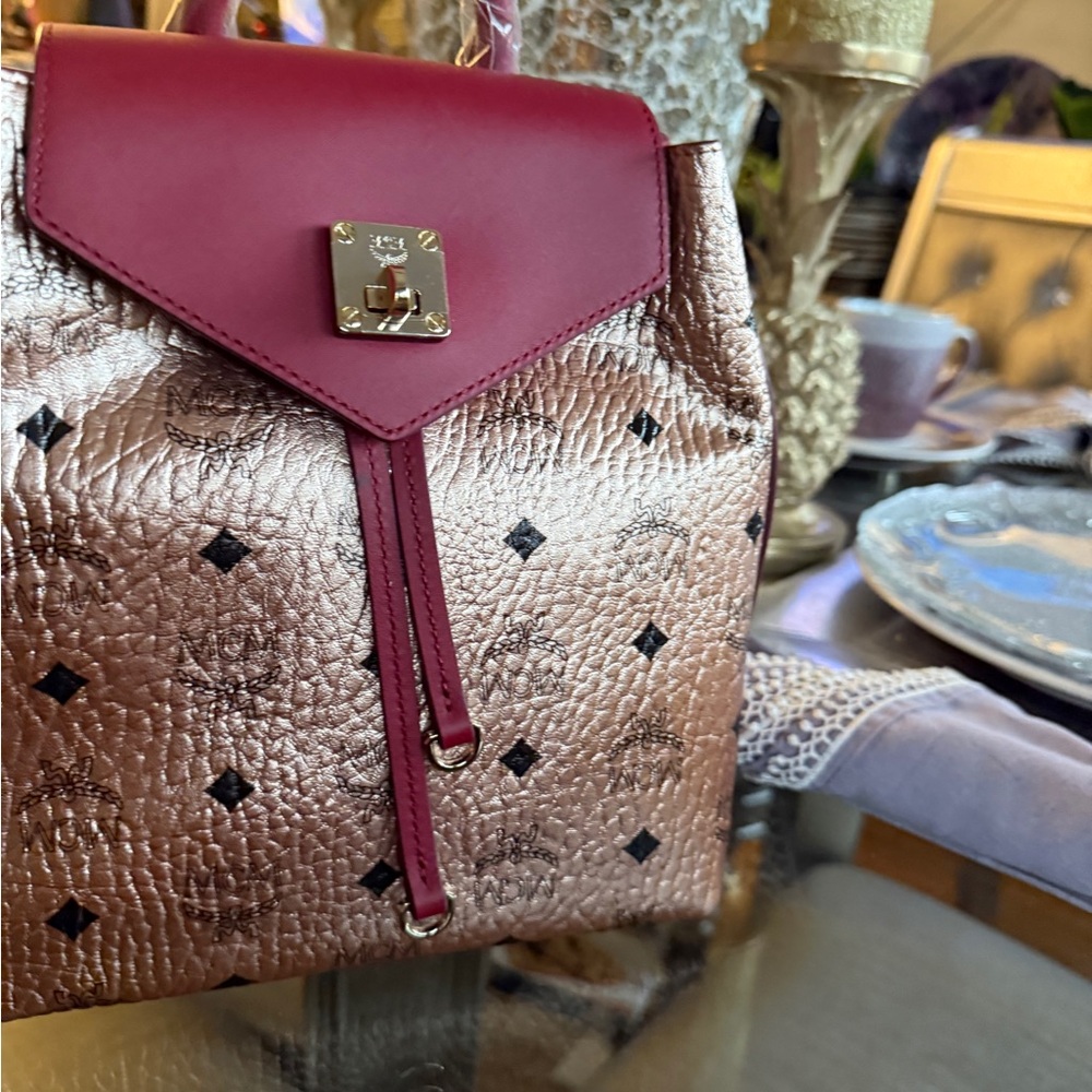 Chic Pink and Gold Backpack with Metallic Finish